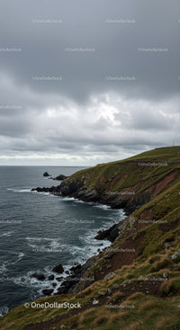 Dramatic Rocky Coastline Under Moody Overcast Sky