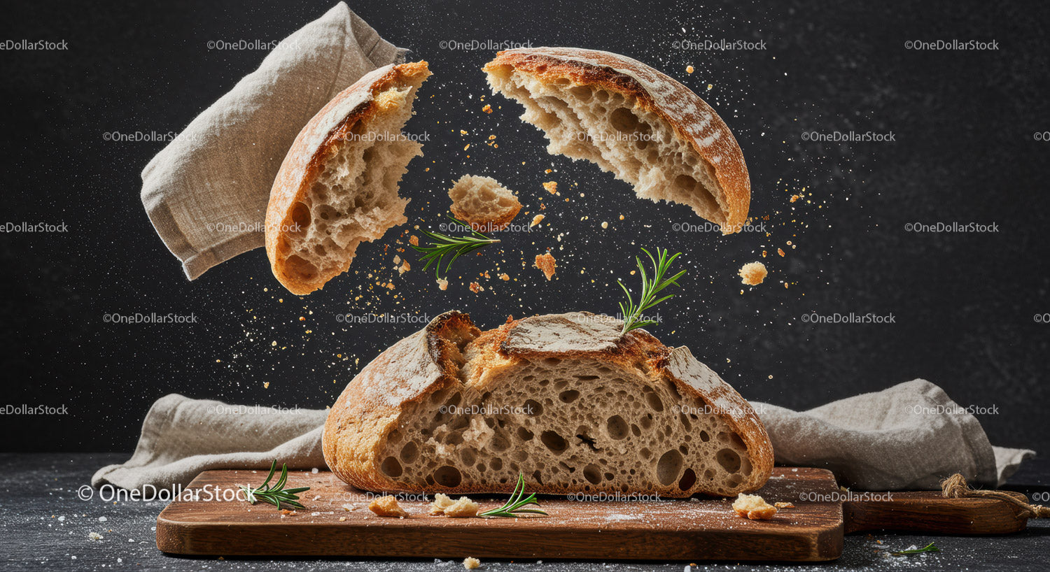 Rustic Bread Breaking with Flying Crumbs and Herbs