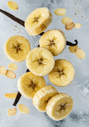 Close-up of sugared banana slices with almond flakes