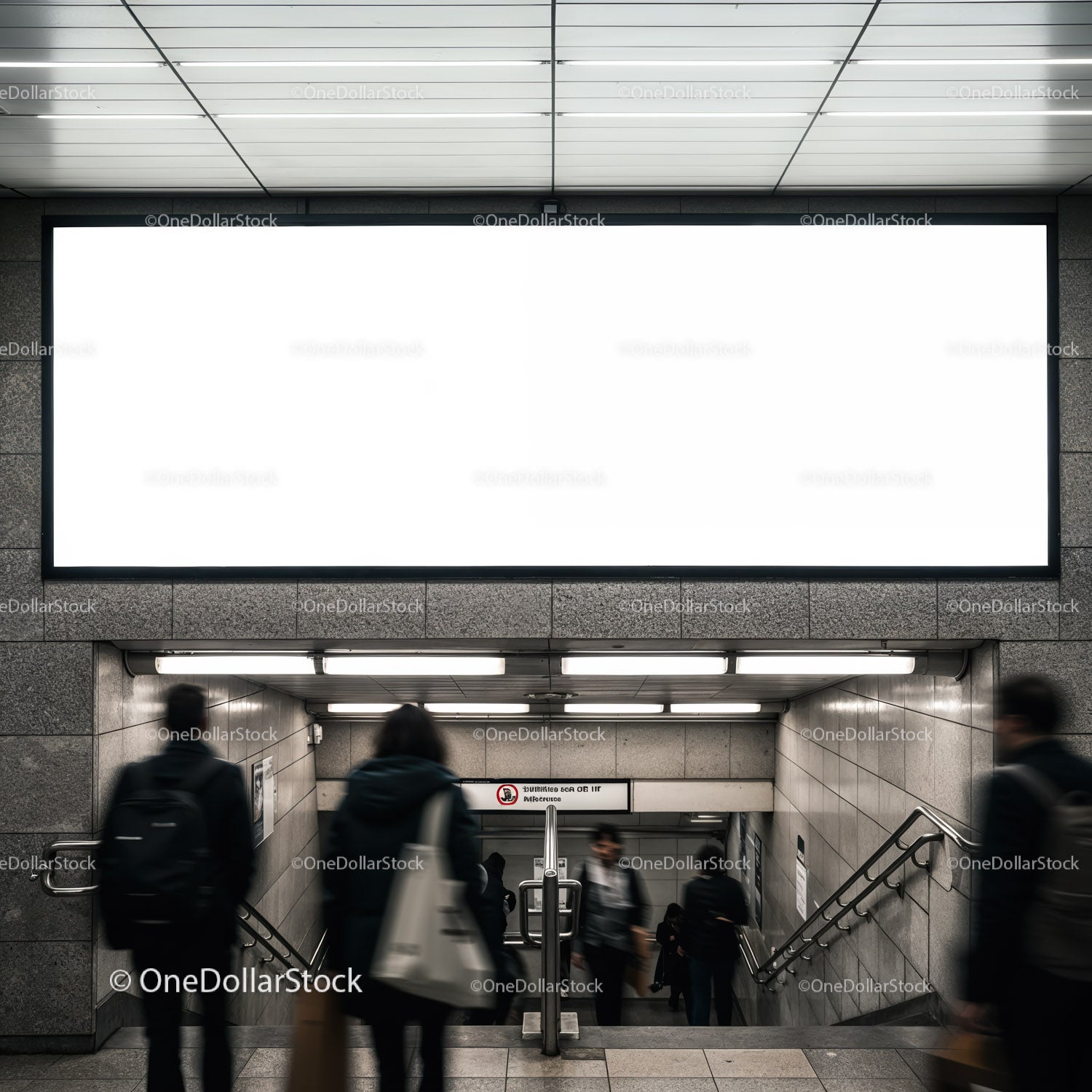 Commuters walking down to subway station entrance