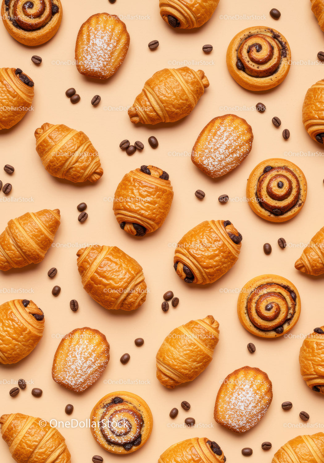 Assorted fresh pastries and coffee beans on beige background
