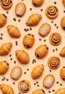 Assorted fresh pastries and coffee beans on beige background