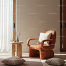 Cozy modern armchair with pillows in bright living room