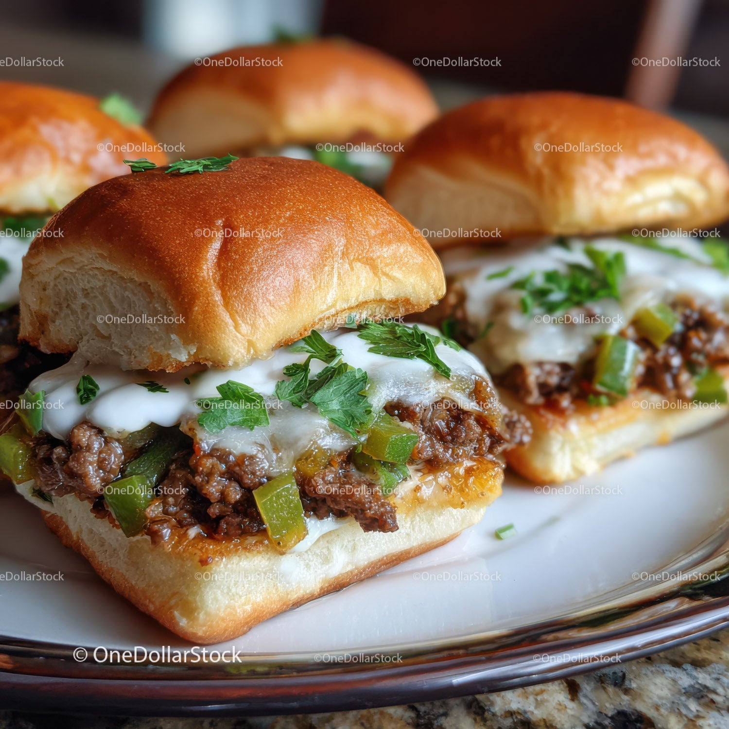 Juicy Beef Sliders with Cheese and Fresh Herbs