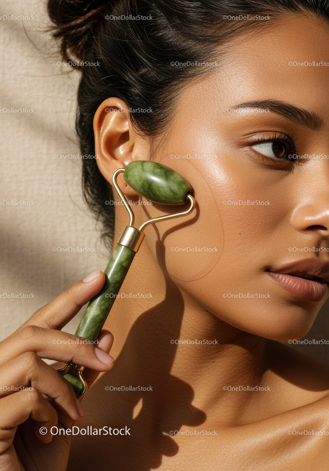 Woman Using Jade Roller for Facial Rejuvenation and Skin Care