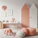 Pastel Kids Room Decor with Soft Pink Elements and Modern Wall Art