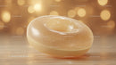 Luxurious Golden Glass Gemstone with Sparkling Glitter in Sunlight