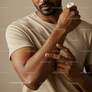 Close-up of Man Applying Moisturizer on Arm for Skin Care Routine