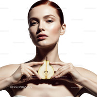 Elegant Woman with Fresh Pear in Bright Minimalist Studio