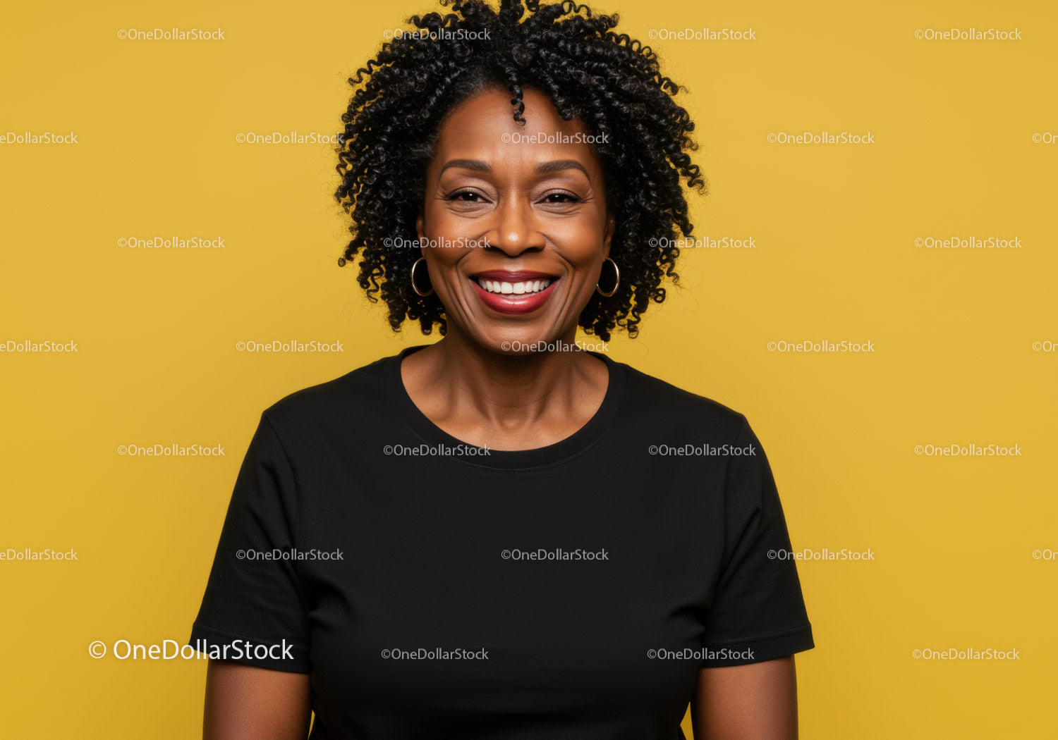 Confident Smiling Woman with Curly Hair in Black T-Shirt on Yellow Background
