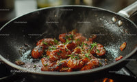 Stir-Fried Chicken with Herbs in a Sizzling Pan