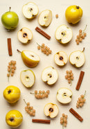 Fresh autumn fruits and cinnamon sticks on light background