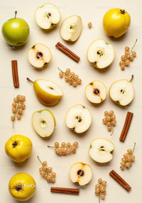 Fresh autumn fruits and cinnamon sticks on light background