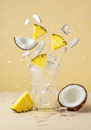Refreshing Pineapple Coconut Drink with Ice Splash