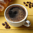 Freshly Brewed Coffee in a White Mug on a Wooden Table
