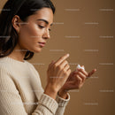 Woman Applying Skincare Cream for Healthy Glowing Skin