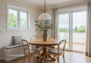 Cozy dining area with wooden table and natural light