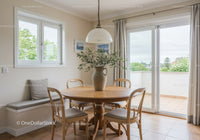 Cozy dining area with wooden table and natural light