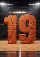 Basketball styled number nineteen on court floor