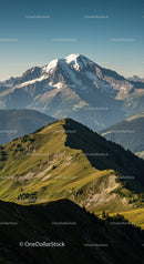Majestic Snow-Capped Mountain with Green Hills and Blue Sky