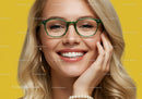 Smiling young woman with stylish green eyeglasses