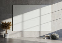 Minimalist living room with blank canvas and sunlight