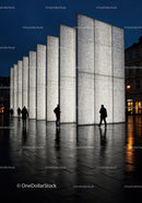 Contemporary Nighttime Light Art Installation in Urban Plaza