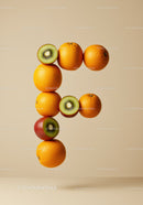 Creative fruit arrangement in shape of letter F