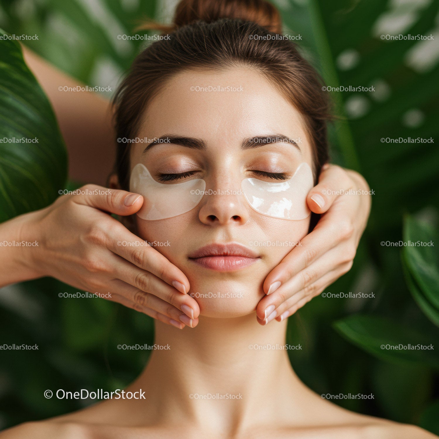 Elegant Woman Receiving Facial Skin Care in Spa Environment