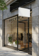 Modern boutique entrance with minimalist clothing display
