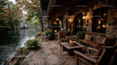 Rustic Stone Riverside Cottage with Cozy Outdoor Seating and Warm Lighting