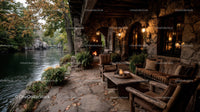 Rustic Stone Riverside Cottage with Cozy Outdoor Seating and Warm Lighting