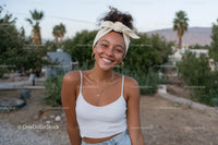 Young Woman Smiling Outdoor Portrait with Summer Fashion and Natural Setting