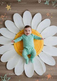 Happy Infant Relaxing on Oversized Flower Mat