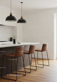 Minimalist Kitchen with Bar Stools and Pendant Lights in Bright Space