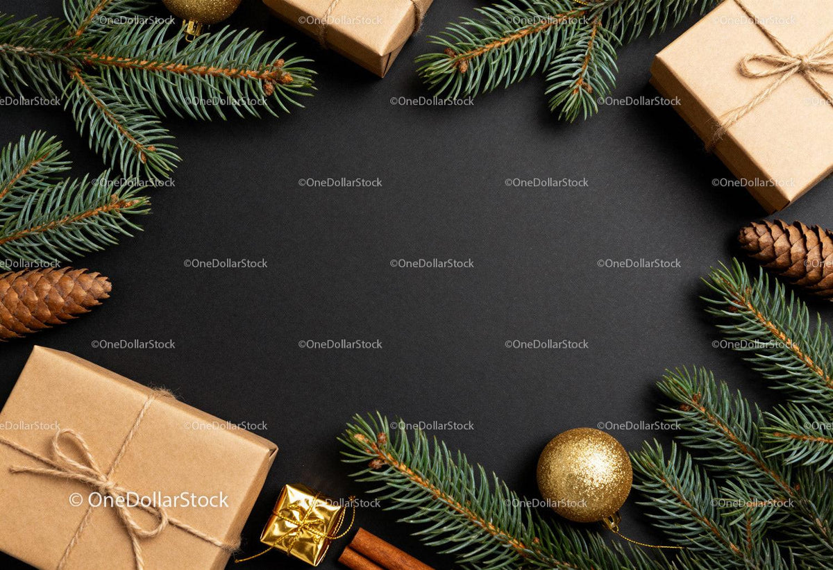 Festive holiday gifts with pine and golden decorations