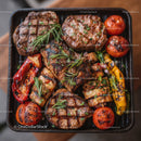 Grilled Beef Steaks with Roasted Cherry Tomatoes and Bell Peppers