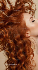 Close up of woman with flowing curly red hair