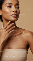 Elegant Portrait of a Woman with Glowing Skin and Serene Expression