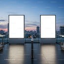 Urban rooftop with two large illuminated billboard displays