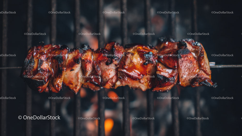 Colorful Grilled Meat and Vegetable Skewers on Barbecue Grill