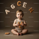 Baby Playing with Alphabet Plush Letters on Brown Background