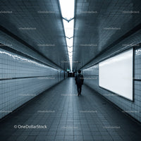 Underground Subway Tunnel with Modern Tiled Walls and Bright Ceiling Lighting