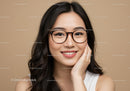 Portrait of Smiling Young Woman with Glasses and Long Dark Hair