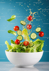 Fresh Salad Ingredients Splashing in White Bowl