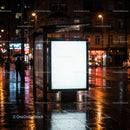 Night City Street with Illuminated Bus Stop and Neon Signs