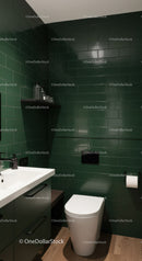 Modern Bathroom with Green Tile Walls and Sleek White Toilet