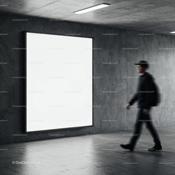 Blurred man walking past illuminated blank billboard indoors JPG Mockup Image