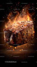 Juicy Steak on Fire with Flames and Sparks in a Dark Background