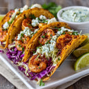 Seafood Shrimp Tacos with Fresh Vegetables and Lime